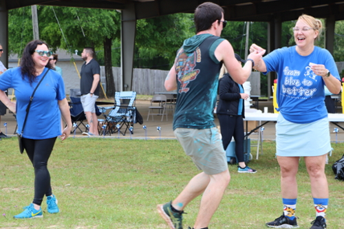 Runners getting water during 5k